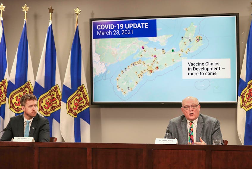 Nova Scotia Premier Iain Rankin and Dr. Robert Strang, chief medical officer of health, hold a news conference Tuesday, March 23, 2021, on the latest COVID-19 immunization plans.