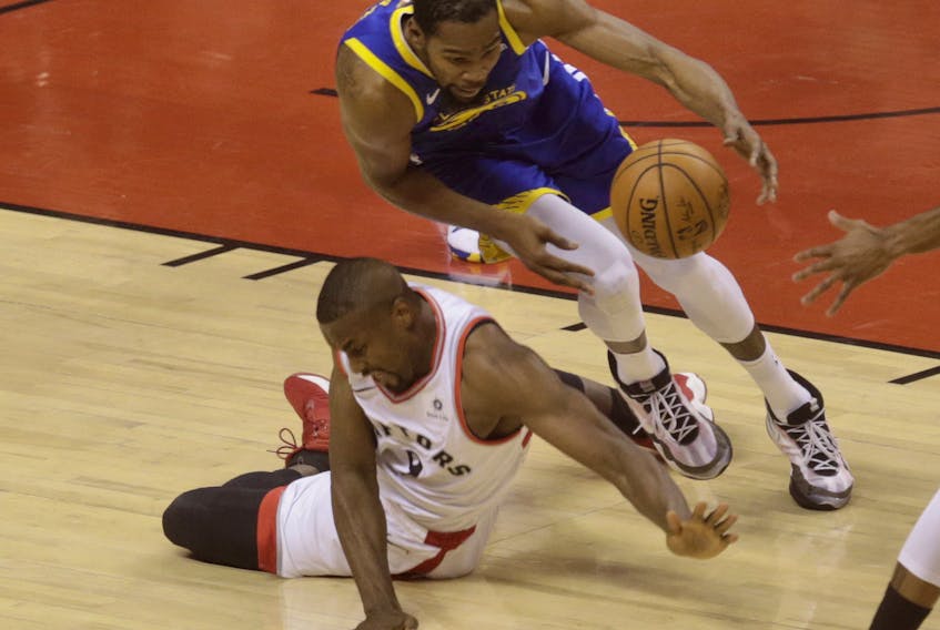 Kevin Durant hits the deck during Game 5 of the NBA Finals while chasing the ball with Serge Ibaka.
