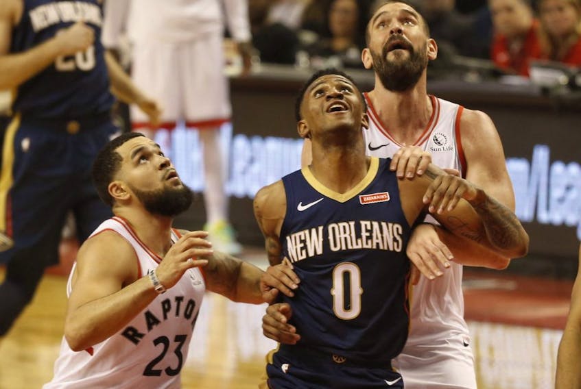 Pelicans’ Nickeil Alexander-Walker (middle) is sandwiched between Raptors’ Fred VanVleet (left) and Marc Gasol  during the second quarter at Scotiabank Arena Oct. 22, 2019. Jack Boland/Toronto Sun