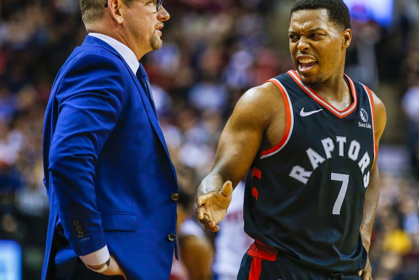 Raptors head coach Nick Nurse (left) says Kyle Lowry and the Raptors are looking good in training in Florida.