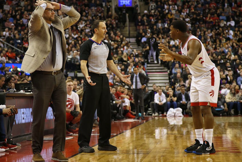 Toronto Raptors coach Nick Nurse and Kyle Lowry aren't happy about a non-call double dribble with referee Andy Nagy during the second half in Toronto, Ont. on Tuesday December 3, 2019. Jack Boland/Toronto Sun/Postmedia Network