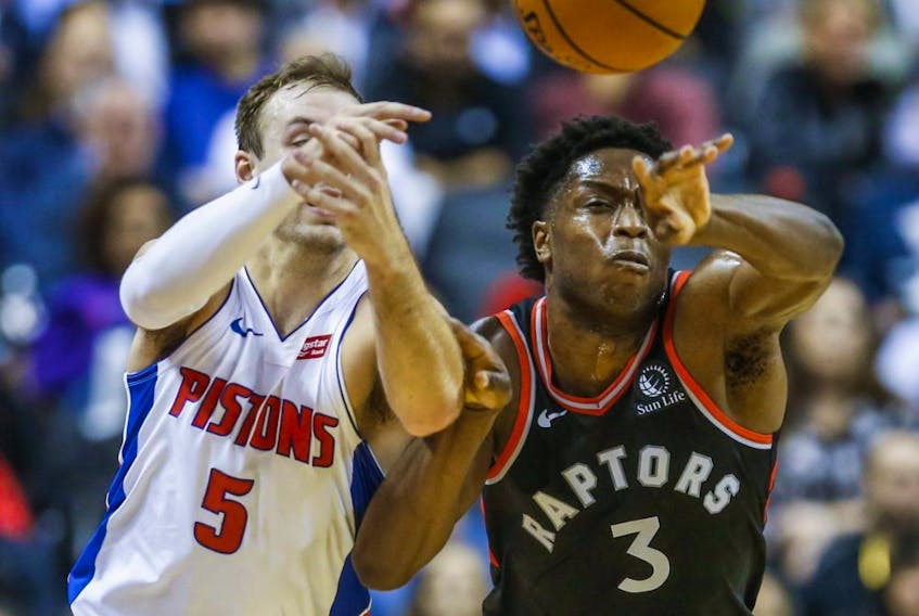 OG Anunoby of the Toronto Raptors and Luke Kennard, then of the Detroit Pistons, battle for the ball at Scotiabank Arena in Toronto on Oct. 30, 2019. 
