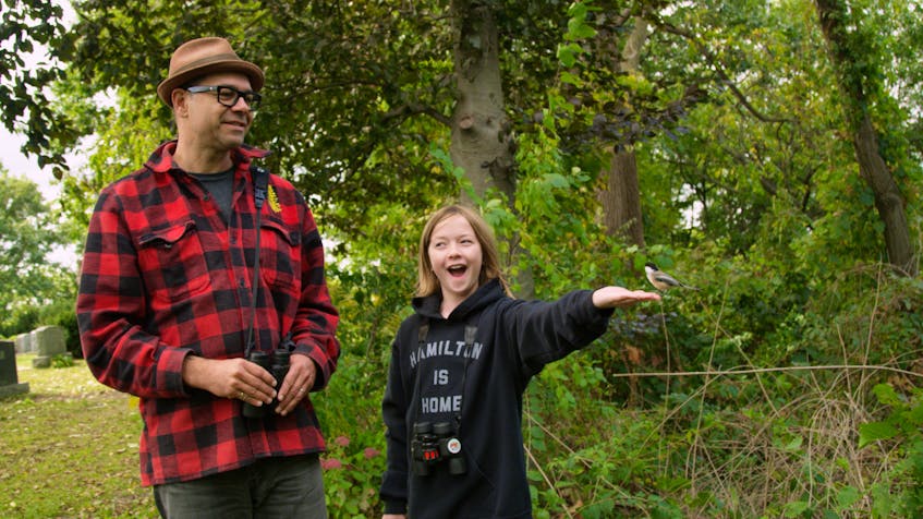 Hardcore birder Paul Riss and his daughter Georgia Wren commune with a curious chickadee in Michael Melski's new documentary The Rare Bird. The colourful look at the world of North American birding airs on CBC Docs POV on Saturday at 8 p.m. and on the free CBC Gem streaming service.