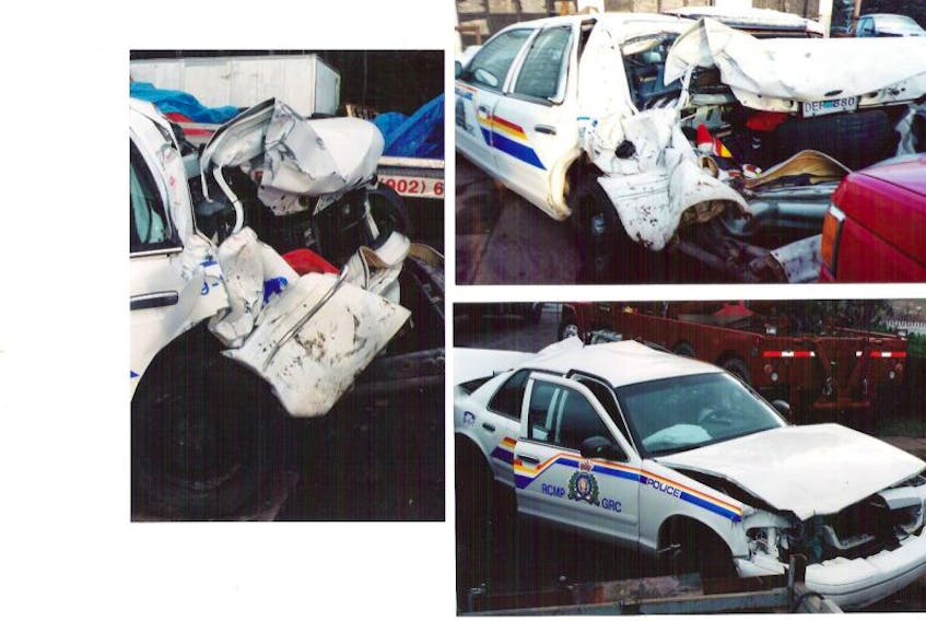 Retired Amherst RCMP officer Paul Calder was in a serious collision in November 2001 when he had stopped at the side of the highway near Amherst to help a motorist. He was in his vehicle when it was struck from behind by a shuttle van. These photos show how much damage was inflicted to Calder's cruiser.