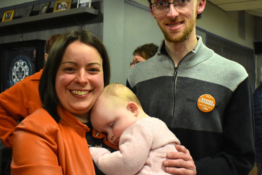 New MLA Kendra Coombes holds daughter Rory while celebrating her byelection victory in Cape Breton Centre with partner Matt Brown in New Waterford on March 10. Due to public health regulations surrounding COVID-19, Coombes has yet to make it to Province House in Halifax, although she has taken part in some two-dozen New Democrat caucus meetings. CHRIS CONNORS/CAPE BRETON POST