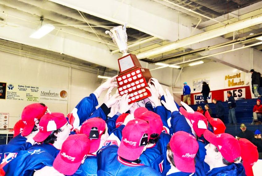 King's-Egehill School of Windsor, N.S., hoist the Red Cup Showcase trophy.