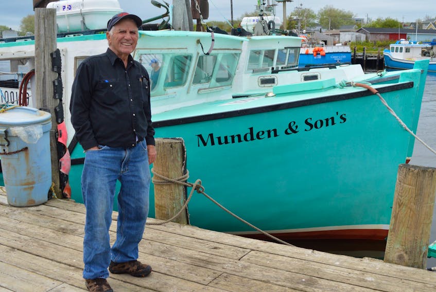 Longtime fisherman Jim Munden stands on the Glace Bay wharf in front of a couple of the fishing boats that supply fresh lobsters to the dock-side Munden’s Lobster Pound on a daily basis. The soon-to-be 89-year-old has been fishing since he was nine-years-old. DAVID JALA/CAPE BRETON POST
