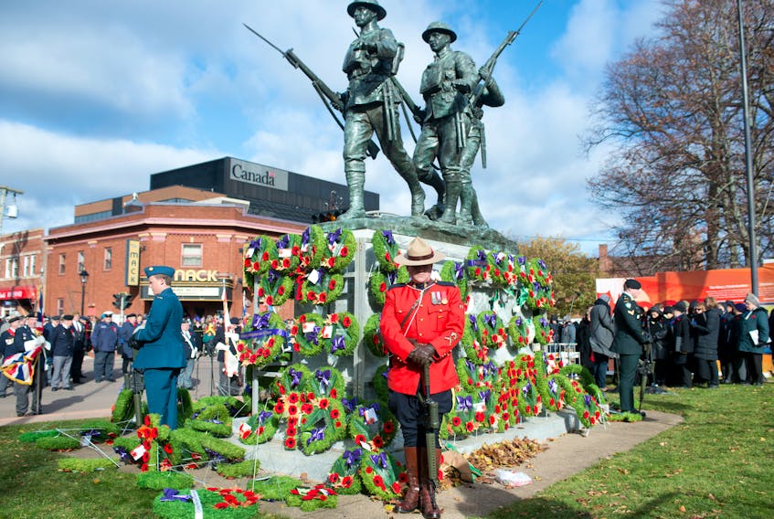Despite cold temperatures and construction at Province House several thousand people gathered at the cenotaph in Charlottetown for Remembrance Day services. BRIAN MCINNIS/THE GUARDIAN