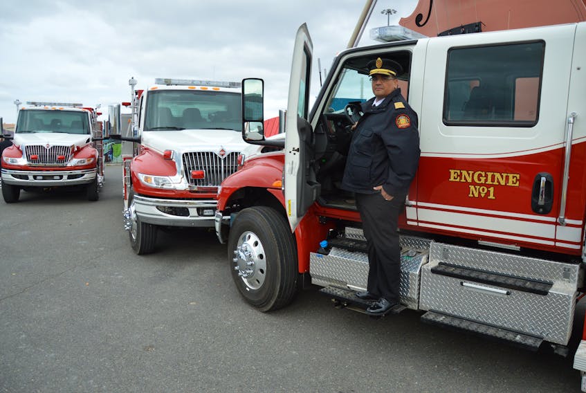 Regional Fire Chief Stephen Seth shows off one of three new vehicles Friday purchased by the municipality for three volunteer departments. The move is among the first steps to help unify the regional service which is largely supported by volunteers. CAPE BRETON POST PHOTO