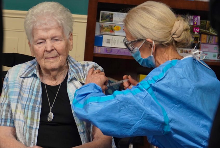 Doreen Wooder, a resident at the Wedgewood Manor in Summerside, became the first Prince Edward Islander to receive the Moderna vaccine for COVID-19 on Friday. A member of the P.E.I. Public Health team administered the vaccine.