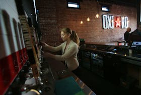 Diana Lewis, Garrison Brewing's marketing and events co-ordinator, pours a sampler at the Oxford, formerly part of the old Oxford Theatre, in Halifax last November. The taproom will be the first location to get Draught Pro Certified.
TIM KROCHAK The Chronicle Herald 