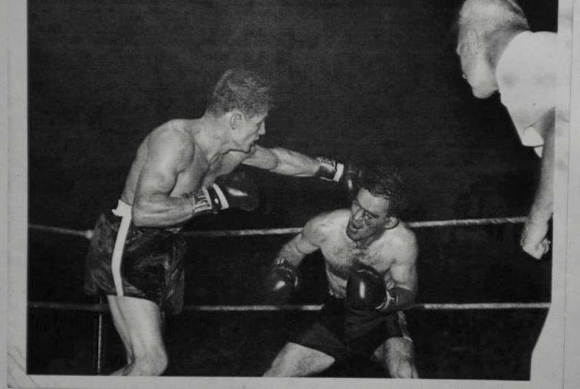 Tyrone Gardiner, right, lightweight champion of Canada, defended his title twice at the Glace Bay Miners Forum to sell-out crowds. CONTRIBUTED