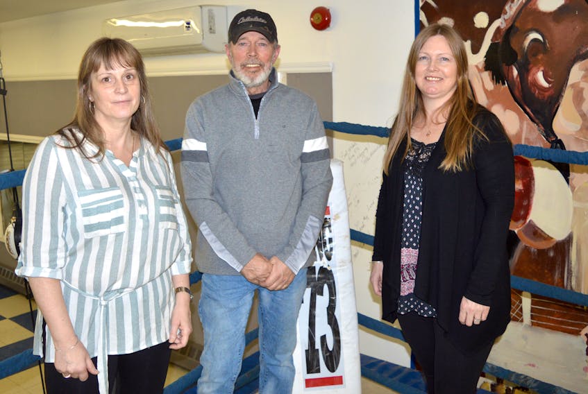 Members of the Cape Breton Boxing Hall of Fame organizing committee at Ring 73 ring on Tuesday. The hall of fame induction ceremony will take place on Friday at the Glace Bay facility. From left, Camille MacMullin, Greg Martin and Javita Hynes. JEREMY FRASER • CAPE BRETON POST