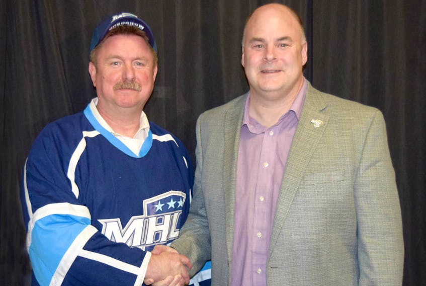 Steven Dykeman, left, is the new president of the MHL, taking over from Dave Ritcey, who has held the position for the past three years.