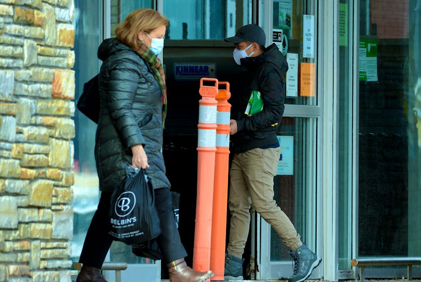Two people wear masks as they shop at a Sobeys grocery store in St. John’s Wednesday afternoon. 

Keith Gosse/The Telegram