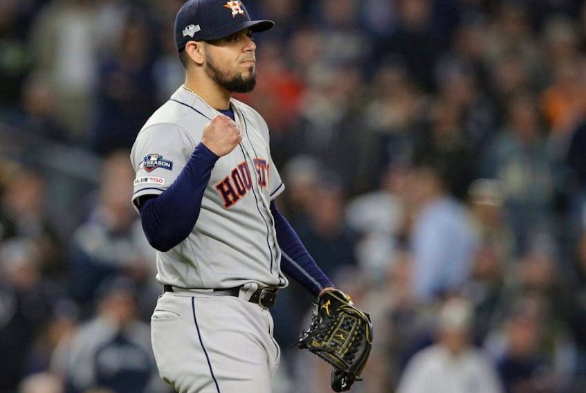 Astros pitcher Roberto Osuna reacts after defeating the Yankees in Game 3 of the 2019 ALCS at Yankee Stadium in New York City, on Oct. 15, 2019.