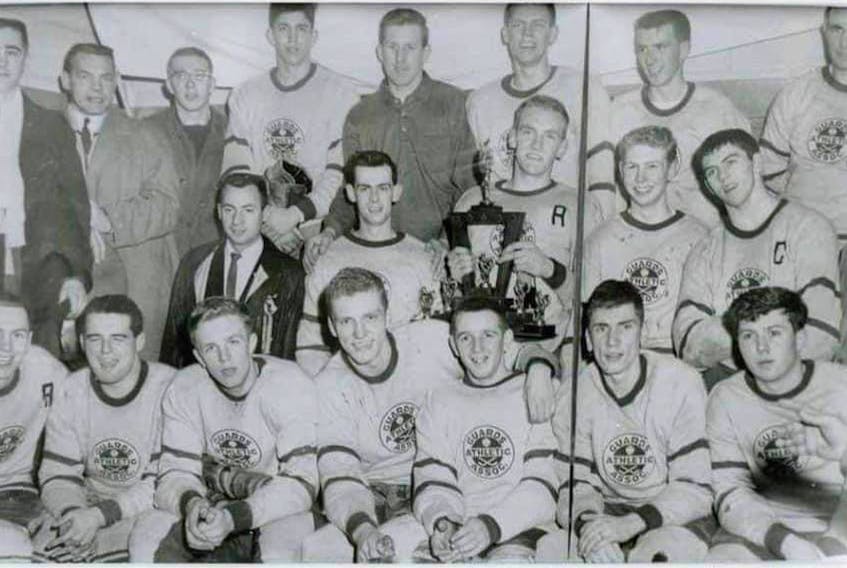 Guards won the 1961-62 St. John’s Senior Hockey championship and the Boyle Trophy. Members of the championship team are: (from left, first row) Rollie Clark, Bill Drover, Ian Campbell, Jim Drover, Eggie Billard, Bob Babcock, Geoff Campbell; (middle row) Art Pearce, Bert Warr, Jack Drover, Dave Butler, Gar Pynn; (back row) Ross Keeping, coach Howie Meeker, Bruce Bradbury, Bob Williams, Murray Chaplin, Wilson Wiseman, Eddie Vatcher and Joe Slaney. Jim and Jack Drover were brothers, Bill Drover was a cousin who grew up in Bay Roberts, Gar Pynn was from Grand Falls attending Memorial University, Joe Slaney was from Bell Island, Ross Keeping from Nova Scotia and Rollie Clarke had moved from Corner Brook to St. John’s. The team included junior-aged players Jack Drover, Ian Campbell, Dave Butler, Bob Williams, and Wils Wiseman. — Submitted photo