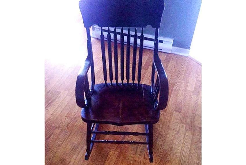 This wooden rocking chair had been in Shelly Butt-Ivey’s family for more than 100 years before being sold by accident last week. She’s devastated, and is hoping the person who has it will contact her and let her buy it back, with a reward. — Submitted photo