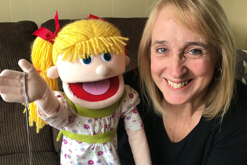 Myrna Moss, executive director of the Tree House Family Resource Centre in Deer Lake, is pictured with her puppet friend Sally. Sally is a favourite at the centre and its branch locations. Moss wrote “The Happy Wave,” a song Sally sings about staying connected while social distancing.
Contributed