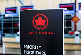 Air Canada check-in signage at Vancouver's international airport in Richmond, B.C. REUTERS/Ben Nelms/File Photo
