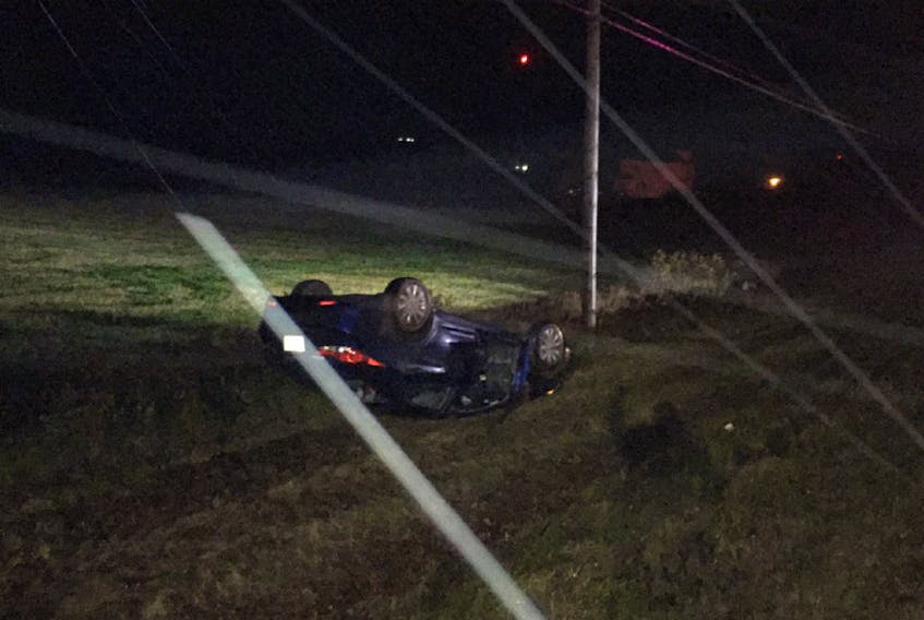 A P.E.I. woman was charged with impaired driving after this single-vehicle rollover in Summerville on Tuesday.
