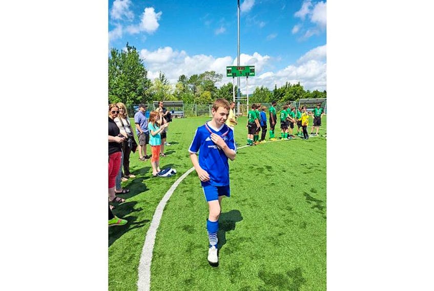 <p>Ryan Janes is shown wearing his medal after he helped Corner Brook win gold at the provincial Under-14 boys mega soccer tournament Sunday at Wellington Street Sports Complex.</p>