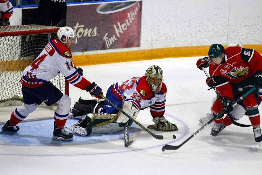 Halifax Mooseheads centre Marcel Barinka tries to beat Moncton Wildcats goaltender Charles-Antoine Lavallee during a QMJHL pre-season game at the Halifax Forum on Saturday.