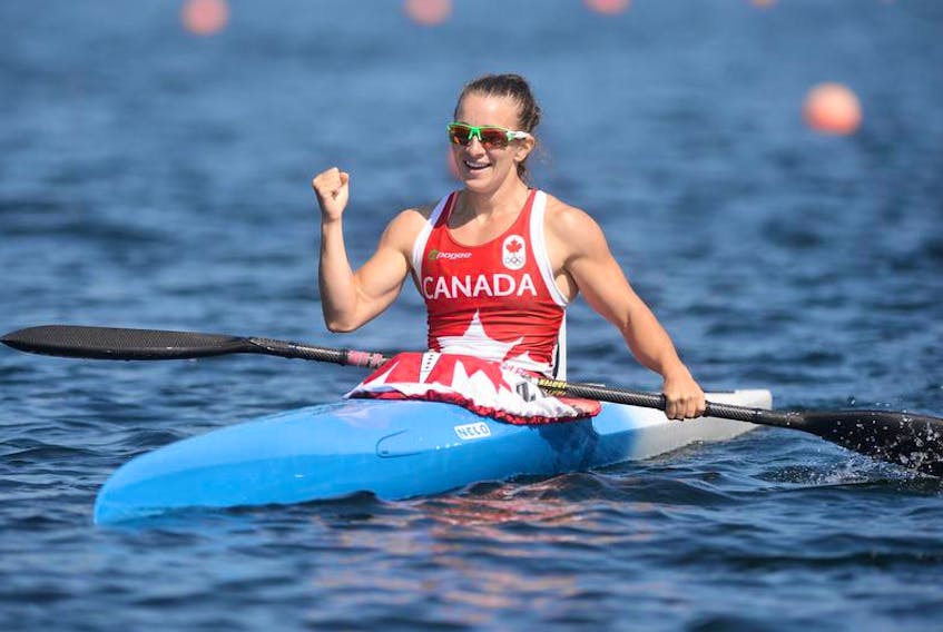 Canada’s Andreanne Langlois celebrates after winning Sunday’s senior women’s K-1 200-metre final at the Pan-Am Canoe Sprint Championships on Lake Banook.