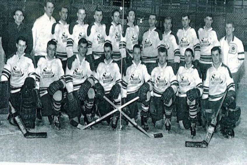 <span class="Normal">The Saint Dunstan's University Saints won the Maritime intercollegiate hockey championship in 1964-65. Front row, from left, are Mike Harley, Rex McCarville, Derrel Pollock, Gordie Whitlock, Vince Mulligan, Mike Kelly, Andre Gelinas and George MacNeill. Second row, coach Jack Kane, trainer Dave O'Connell, Jack Hynes, Maurice Roy, George Monaghan, Yvon St. Arnaud, Glen Hughes, Arthur LeClair, Denis DeCarufel, George MacMillan, Billy MacMillan and manager Jim Levy. <br /></span>