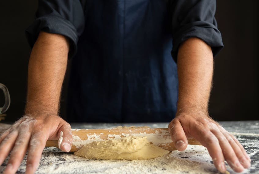 A basic pizza dough requires only five ingredients and a little kneading. 