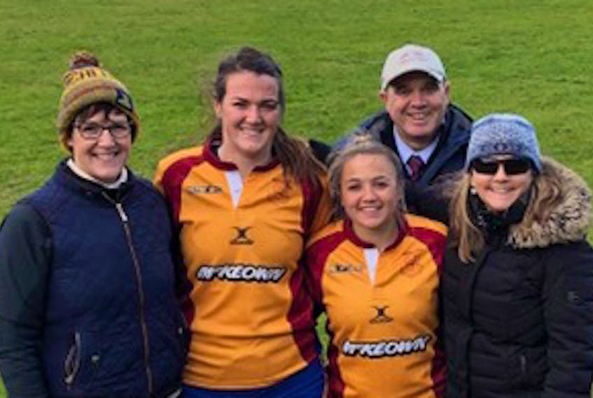 Sara McCarron and Alison Blanchard of Waitaki Athletic Marist women’s rugby team in New Zealand after a match with Green Island. They are pictured with their parents – Lee McCarron (left) and Brian and Sharon Kenny-Blanchard (an Antigonish native). Brian also coaches the team. Contributed