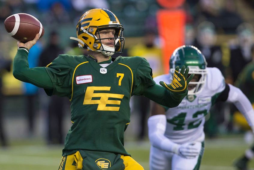 The Edmonton Eskimos' Calvin McCarty (31) and quarterback Trevor Harris (7) celebrate McCarty's touchdown against the Saskatchewan Roughriders during first half CFL action at Commonwealth Stadium in Edmonton Saturday Oct. 26, 2019. Photo by David Bloom