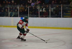 Kensington Wild forward and assistant captain Landon Clow carries the puck up the ice during a New Brunswick/Prince Edward Island Major Midget Hockey League game at Credit Union Centre in Kensington earlier this season.