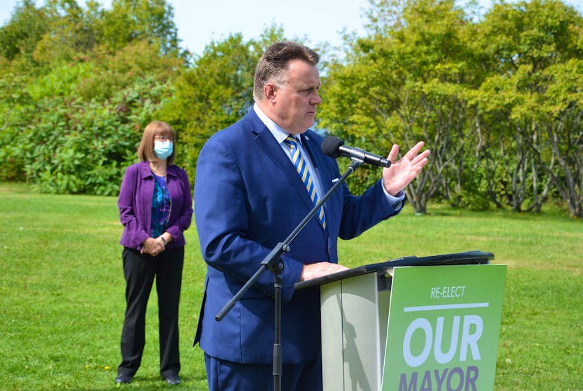 Mike Savage, with former Liberal cabinet minister Diana Whalen backing him up, kicks off his campaign for a third term as mayor of Halifax Regional Municipality at Africville Park on Tuesday, Sept. 15.