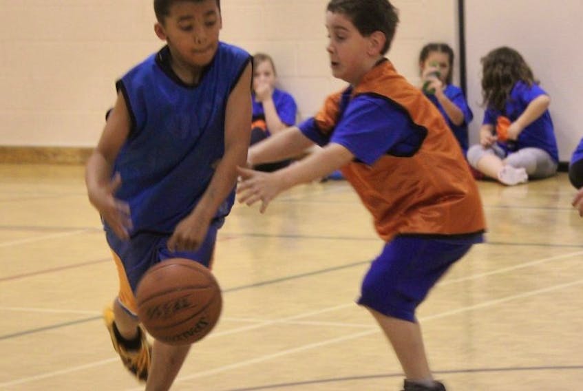 Youngsters scrimmage during action last year in the Shelburne County Basketball Association.  File photo