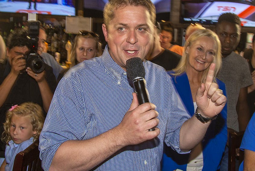 Conservative Party Leader Andrew Scheer addresses faithful at a rally at the Crabby Joe's restaurant on Oxford Rd. at Capulet Lane in London, Ont., on Tuesday Sept. 24, 2019.