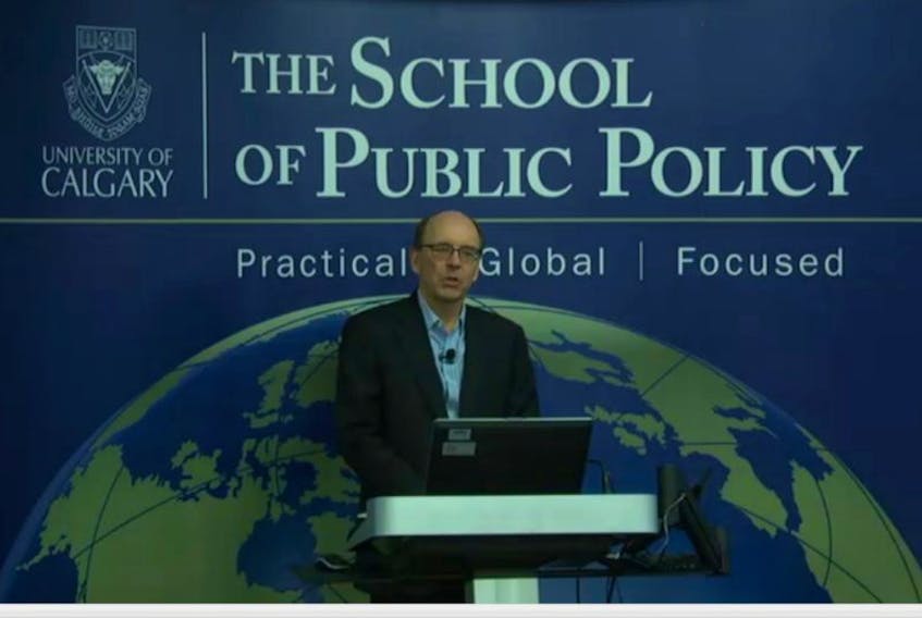 Ron Kneebone, with the University of Calgary’s School of Public Policy, calls for tax hikes and spending cuts by the Government of Newfoundland and Labrador, while presenting new research on provinces dependent on volatile resource revenues. — Screen capture from webcast in Calgary