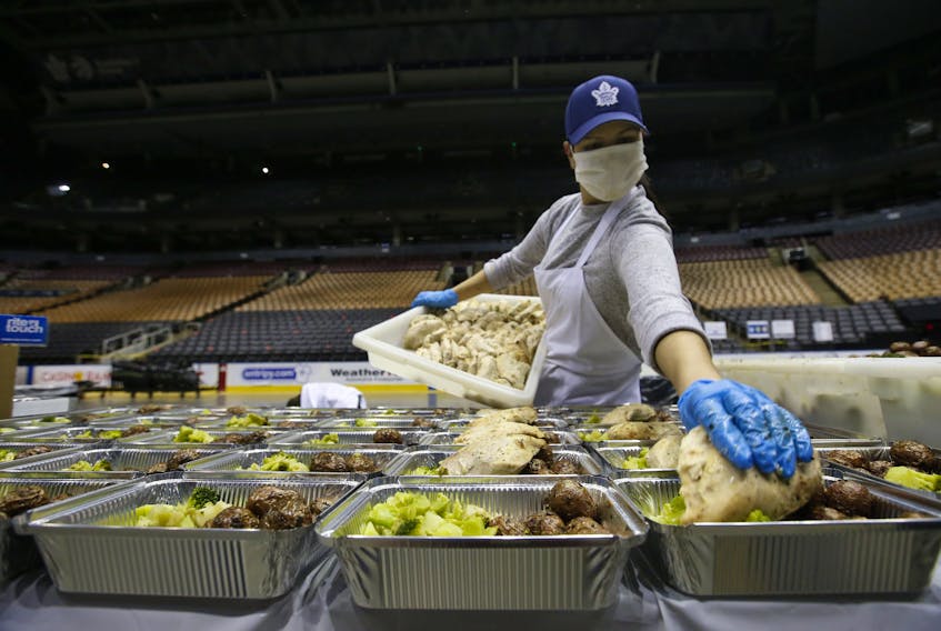 Maple Leafs Sports and Entertainment culinary staff and Second Harvest combined to create 10,000 meals a day to support front-line hospital workers and shelters at Scotiabank Arena in April 2020.