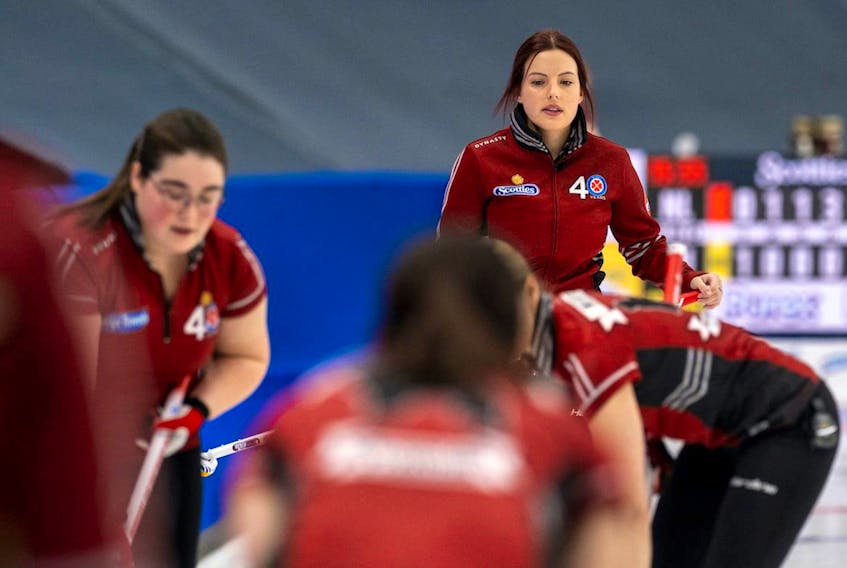After watching her team win its first two games at the 2021 Scotties Tournament of Hearts, rookie skip Sarah Hill (background) found it difficult to add to the victory total. — Andrew Klaver/Curling Canada
