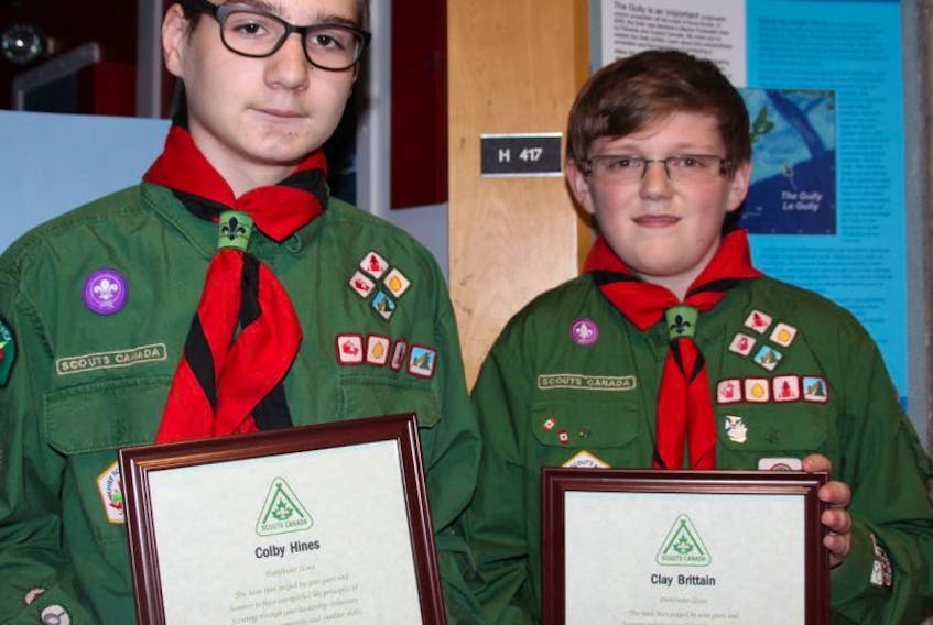 <p>Colby Hines, left, and Clay Brittai, two Scouts from the 2nd Berwick Scout Troop, received the Chief Scout of Canada Award from Lt.-Gov. J.J. Grant April 23 at the Scouts Canada Nova Scotia Council Ceremony in Dartmouth.</p>