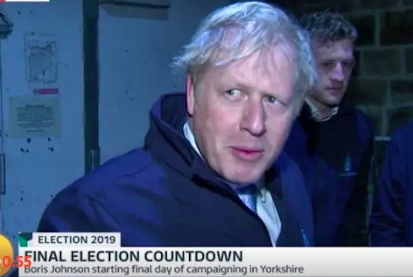 British PM Boris Johnson was recorded hiding in a fridge in an attempt to avoid questions from a reporter early Wednesday morning. 