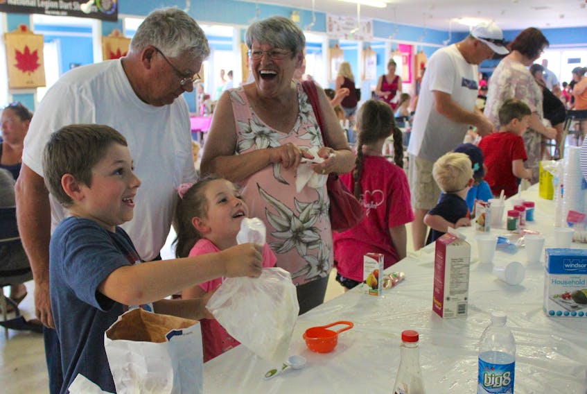 In 2019, from left, Mason Keylor and his sister Leighton from Glace Bay attended the Seaside Daze summer festival in Dominion with their grandparents Lawrence and Susan Wilson. CAPE BRETON POST FILE