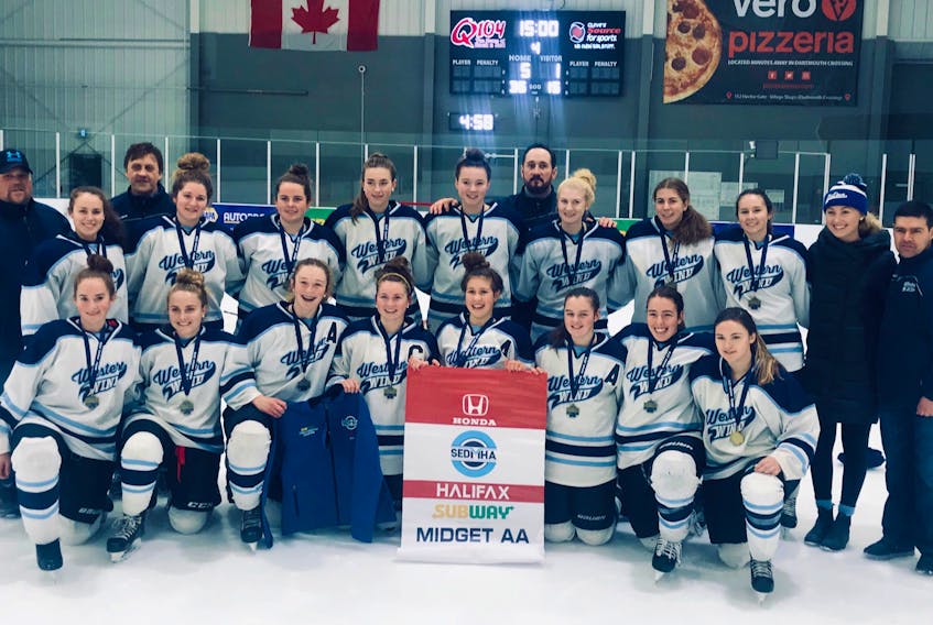 The Summerside-based Western Wind won the Midget AAA Female Division of the SEDMHA hockey tournament in Dartmouth, N.S., on Sunday. Members of the Wind are, front row, from left: Emma Dyer, Katie Snow, Keira MacKendrick, Gracyn Handrahan, Paige Deighan, Hilarie Gaudet, Tianna Gallant and Josee Gallant. Back row: Jeff Hackett (assistant coach), Macy Hackett, Stephen Gaudet (assistant coach), Cailin Gaudet, Brianna McCardle, Kyrsten Coyle, Kylie Campbell, Paul Campbell (head coach), Meredith Rogers, Talynn Banks, Gracie Hackett, Ashton Grigg (assistant coach) and Robbie Gallant (assistant coach).