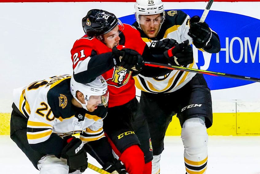 Ottawa's Drake Batherson (19) drops the gloves against Jansen Harkins (58) near the end of the first period action between the Ottawa Senators and the Winnipeg Jets Thursday (feb 20, 2020) at Canadian Tire Centre. Julie Oliver/Postmedia