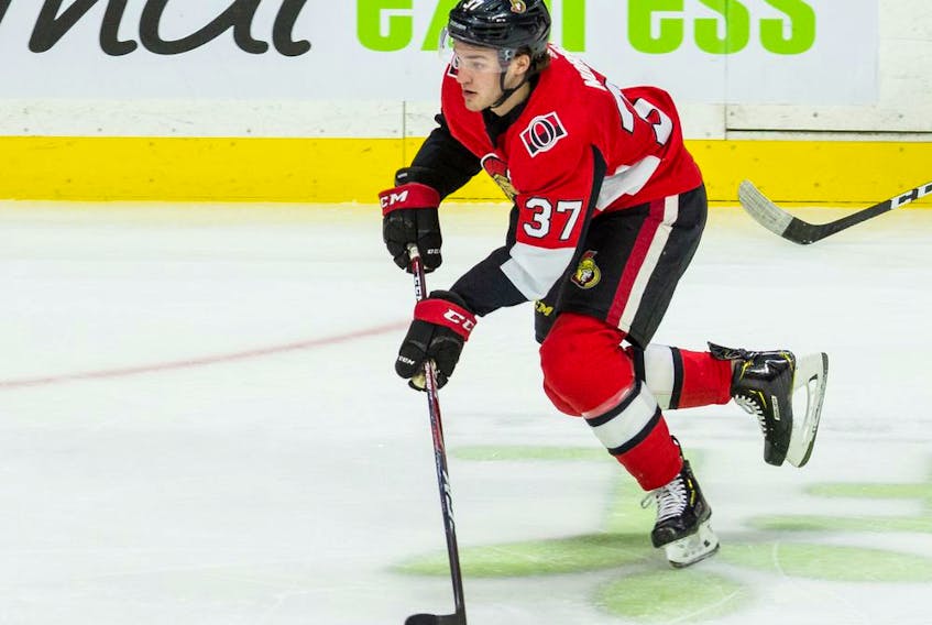 The Ottawa Senators' Josh Norris skates with the puck in his first NHL game against the Montreal Canadiens at the Canadian Tire Centre.