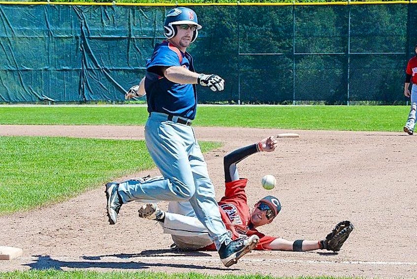 The Corner Brook Barons' Mike Brake safely reaches first base as St. John's Capitals first baseman Corey Ewart is unable to make scoop the ball during Game 3 of the Baseball Newfoundland and Labrador provincial senior A men's championship Sunday at St. Pat's Ball Park in St. John's. Brake advanced to second on the errant throw. The Barons take a 2-1 lead in the best-of-seven series back to Corner Brook next weekend.