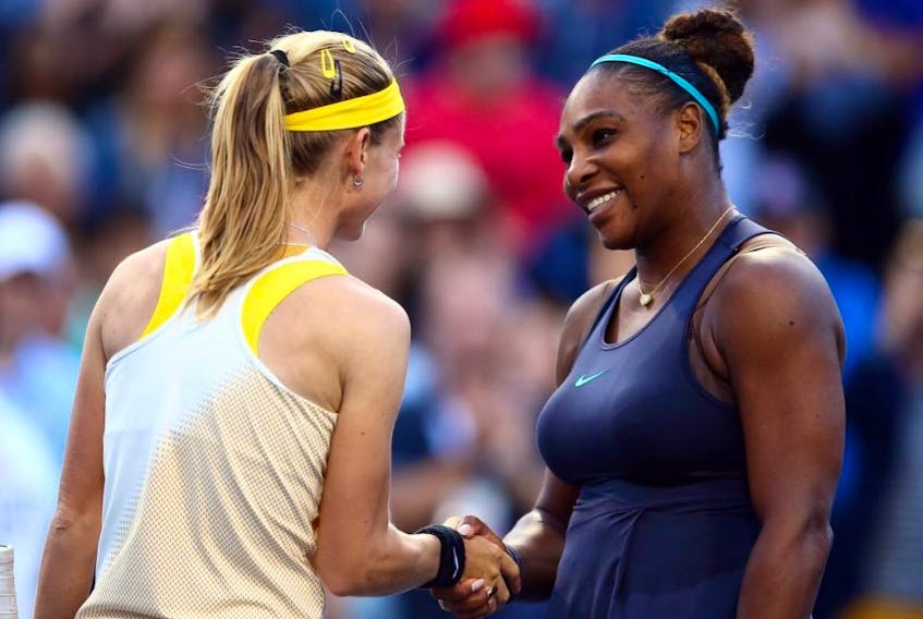 Serena Williams shakes hands with Marie Bouzkova following a semifinal match on Day 8 of the Rogers Cup at Aviva Centre in Toronto on Saturday, Aug. 10, 2019.
