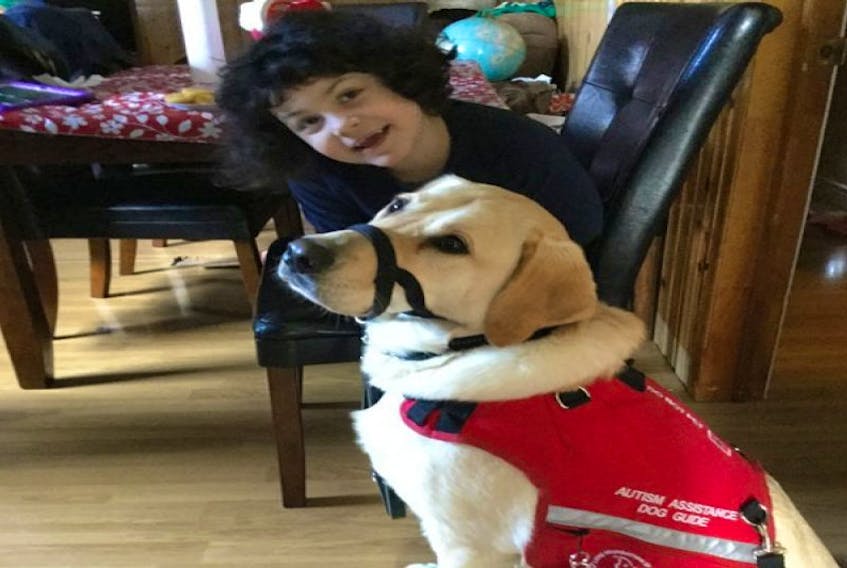 Lisa Morhart’s daughter Sonnet has formed a close bond with her autism assistance guide dog, Trenton, provided by the Lions Foundation of Canada. Trenton recently saved Sonnet’s life.
