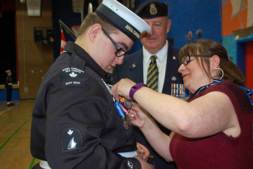 Kurtis Kurr earned the The Royal Canadian Legion Medal of Excellence. His mother, Joanne, had the honour of pinning the medal on him.