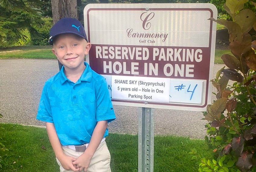 Five-year-old Shane Sky scored special parking privileges for his toy jeep after an ace at Carnmoney Golf Club. Supplied photo